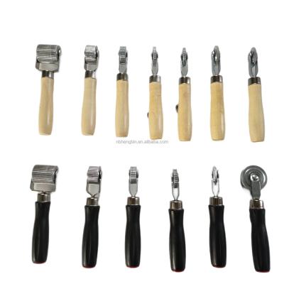 China Steel Wooden Grip Tire Patch Ball Bearing Roller Stapler Tire Repair Tool for sale