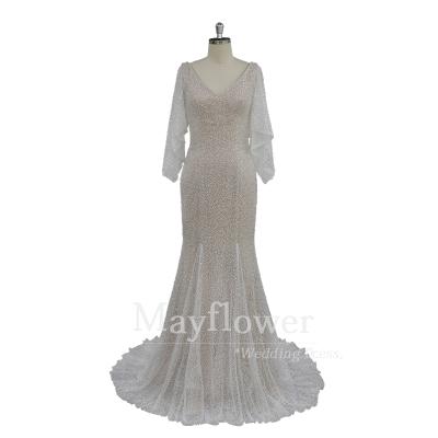 China Anti-Static Illusion Neckline Wedding Dress Beaded Long Sleeves Lace Up Wedding Dress With Sash for sale