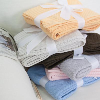 China Custom Logo Soft Plain Non-Toxic Organic Knit Cotton Knitted Baby Blanket Gift Set For Toddler Infant Bedding for sale