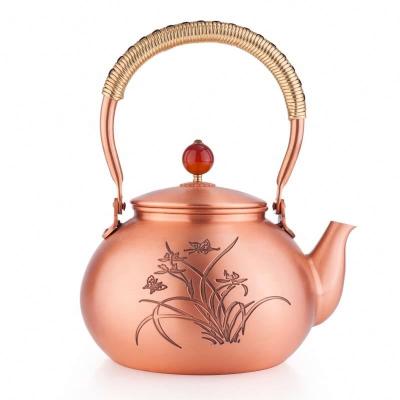 China Stovetop Viable Handmade Solid Copper Teapot Thick Engraved Copper Kettle Hammered Copper Teapot for sale