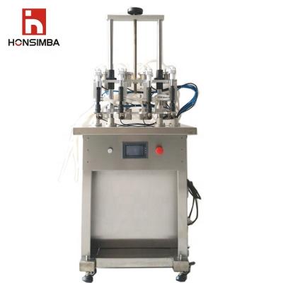 China Hot Sale Food HONSIMBA DQX500L Four Head Automatic Economical Vacuum Filling Machine Economical for sale