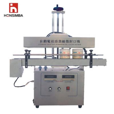 China Hot sale l Convenient efficient high quality electromagnetic food sealing machine HONSIMBA GLF1800 for sale