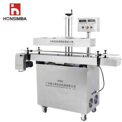 China HONSIMBA GLF2100 Hot Sale High Quality Efficient Convenient Vertical Electromagnetic Sealing Machine for sale