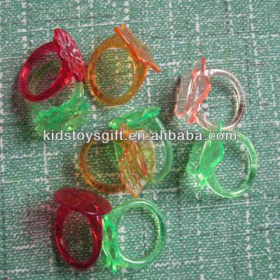 China Promotional coloful mini plastic flower toy rings star heart hand flower/capsule toy for sale