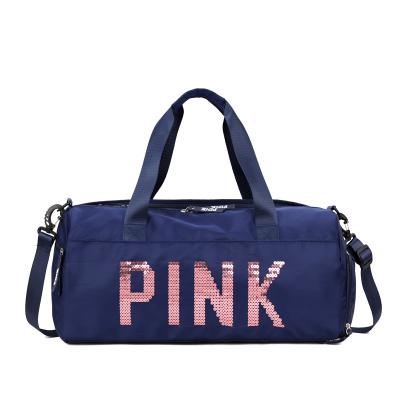 China Fashion Good Quality Mens Womens Sports Travel Gym Fabric Bags Custom Waterproof Duffle Bags With Pink Logo for sale