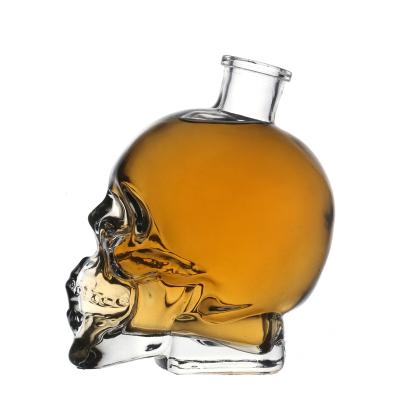 China Glass Wine / Beverage Jar Packaging Manufacturer 400ml 500ml 750ml Skeleton Shaped Clear Customize Big Glass Jar for sale