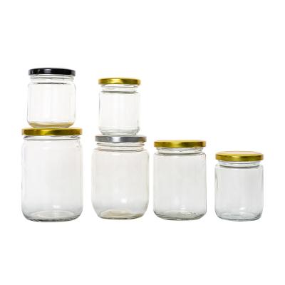 China Wholesale 150ml 240ml 350ml 500ml 770ml Flint Cheap Honey Pickles Jam Beverage Packaging Glass Jars With Lids for sale