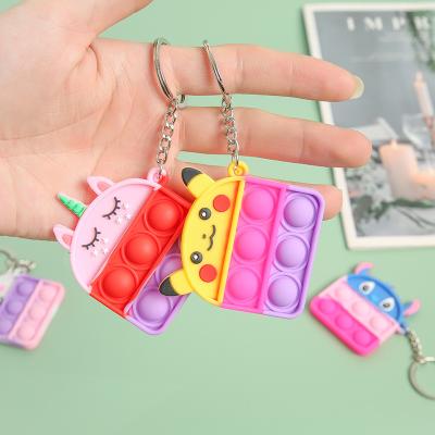 China New Cartoon Mini Silicone Bubble Shape Decompression Silicone Key Chain Cute Kids Adult Decompression Toy for sale