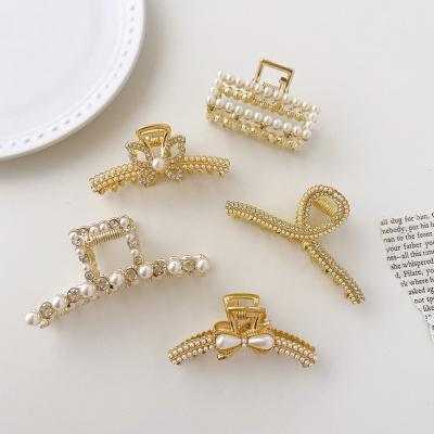 China DOWELL Fashion Korean Wholesale Metal Pearl Butterfly Hair Claw Crystal Clips For Women for sale