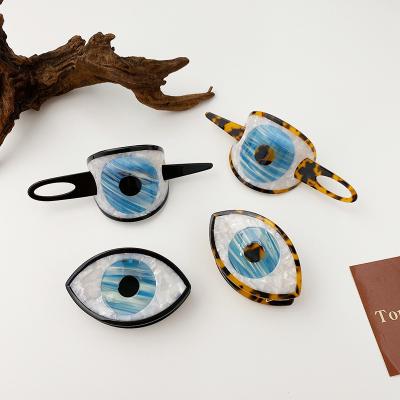 China Fashion DOWELL Big Eyes Retro Hair Clip Back Head Acetate Hair Clip Sticks Hair Accessories for sale