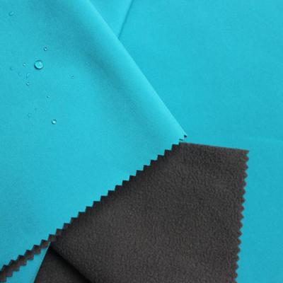 China New Antistatic Softshell Fabric , Fleece Boned Spandex Fabric For Winter Jackets for sale