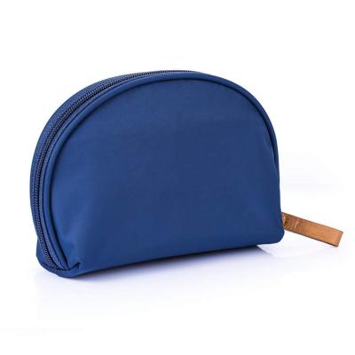 China Portable Makeup Pouch Navy Blue Half Moon Bag Travel Cosmetic Makeup Pouch Waterproof for sale