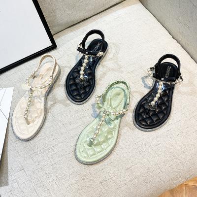 China LX-016 Fashion Glow Pearl Beach CUSHIONING Beaded Sandals Design Lady Fancy Women Ankle Strap Massage Strap Flat Sandals for sale