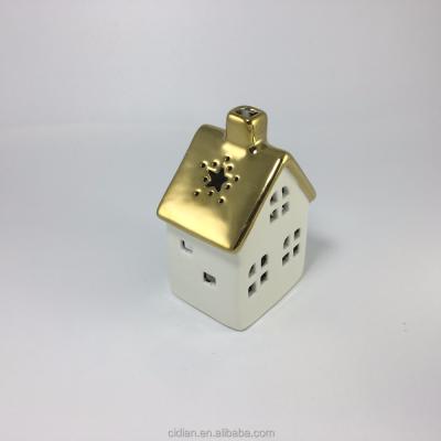 China SOCKET CAKE Christmas ceramic house with metallic roof for sale