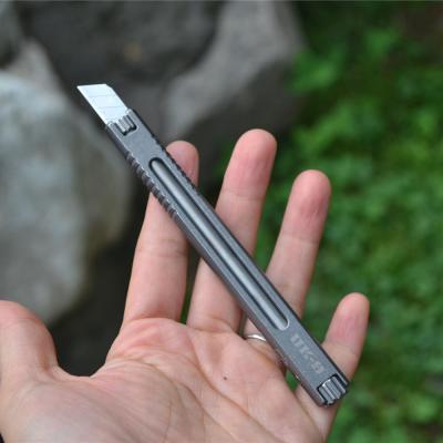 China New Hot Selling Lightweight EDC Tool Knife UK-9 Art Knife Cool Rotate Titanium Multifunctional Serving Knives for sale