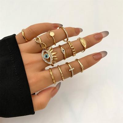 China High Quality New Fashion Wholesale 12pcs Boho Gold Plated Knotted Joint Ring Set Retro Geometric Evil Link Chain Eyes Ring Set for sale