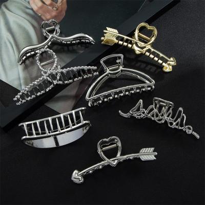 China Hair Claw Fashion Vintage Gold Metal Hollow Geometric Hair Claws Vintage Hair Clips Women Girls Headband Hairpins Shapes Hair Accessories for sale