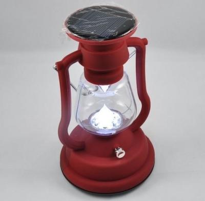 China Battery Charge Solar Panel Sun Charge Bright LED Bulbs 7pcs Inside LED Solar Lamp Camping Lantern for sale