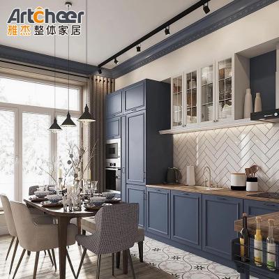 China Modular Kitchen Cabinet Set With Gold Handles And Dark Blue Sectional Design In Plywood Material for sale