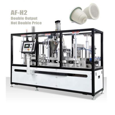 China Food Machine 2022 New Ground Coffee Weighing Double Lanes Nespresso Automatic Filling All-in-One Sealing And Packaging Machine for sale