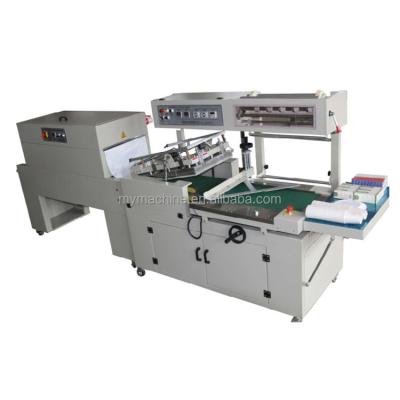 China Useful CLOTHING New Design Automatic Shrink Film Wrapping Machine for sale