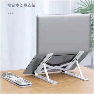 China Collapsible Folding Laptop and Elevator Tablet Heat Dissipation Raised ABS Material Bracket Desk Base for sale