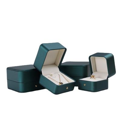 China Elegant Jewelry Packaging Ring Box Dark Green High End PU Jewelry Velvet Inside Jewelry Box for sale