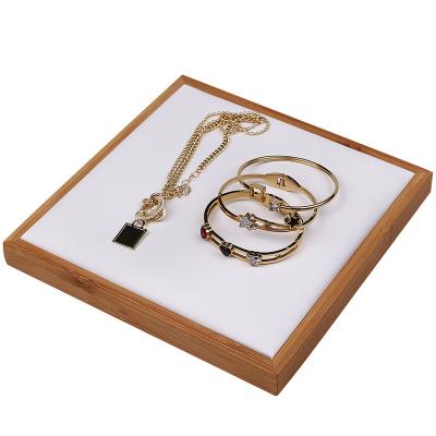 China Newest High End Natural Bamboo With PU Leather Jewelry Display Prop for sale