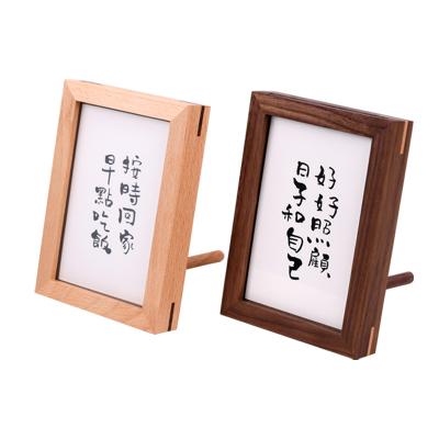 China Photo frame set table picture frame wedding book logo wedding book oriental beech black walnut tenon creative solid wood frame for sale