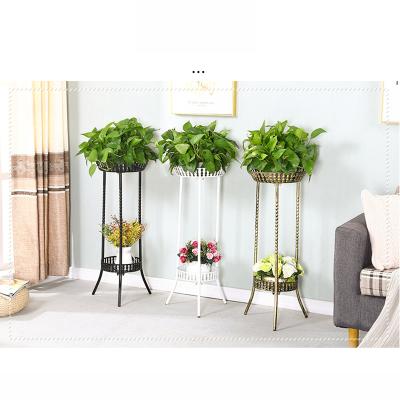 China Wholesale Modern Double Wrought Iron Flower Stand Metal Plant Rack Home Decor Flower Pot Shelf for sale