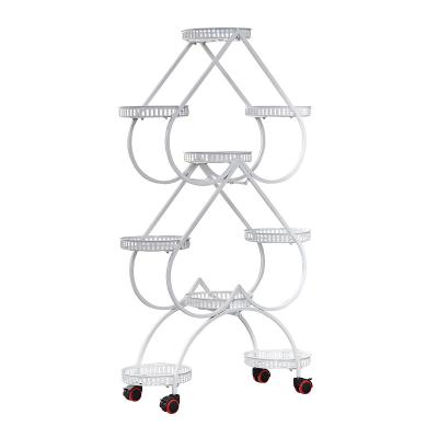 China 2021 New Europe Flower Stand Gardening Heart Form 9-Piece Multi-Layer Iron Plant Stand Flower Por Stands for sale