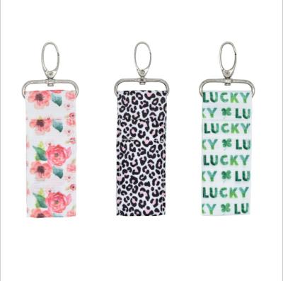 China Fashion portable key chain\comfortable hot\durable creative wavy sale leopard flower fabric lipstick bag for sale