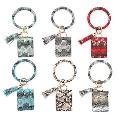 China Women Key Chain ID Card Holder Key Ring Tassel Snake Skin Leather Coin Purse Bracelet Durable Card Pendant Bag for sale