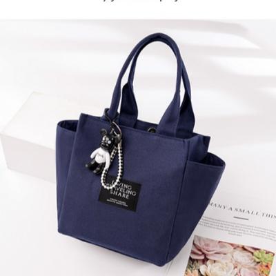 China Cute Fashion Ladies Wholesale Professional Bags Manufacturer Pendant Handbag With Zipper for sale