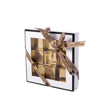 China NUOCAI Gold Recyclable Empty Luxury Wrapping Grids Packaging Food Grade Chocolate Paper Box With Dividers And PVC Window for sale