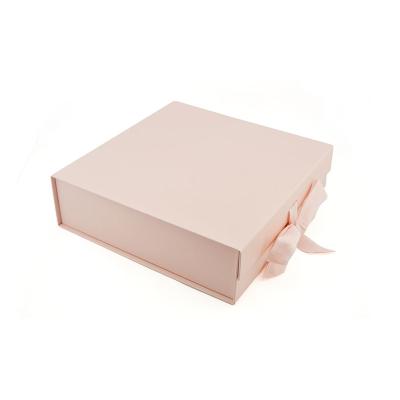 China Recyclable Customizable Luxury Kids Clothes Bundles Ribbons Foldable Gift Box Paper Packing Boxes For Dress Apparel Packing for sale