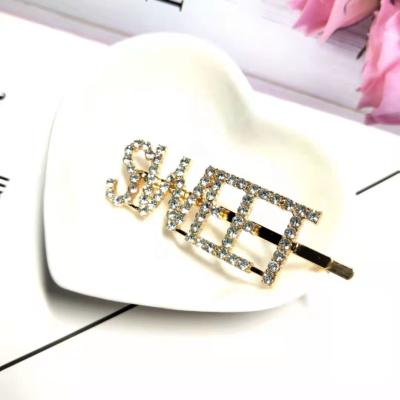 China Silver Fashion Metal Word Hair Clip Accessories Bridal Crystal Rhinestone Paved Letter Hair Pin for sale