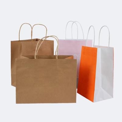 China Packed Colorful kraft paper gift bag fancy clothing packaging bag custom LOGO printed paper bakery bags for sale