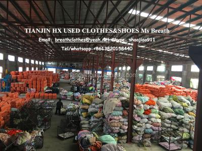 China Tear used clothes in kilogram bales for sale