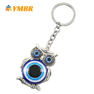 China Lucky Owl And Turkish Glass Elephant Fashionable Hot Selling Blue Evil Eye Key Chain for sale