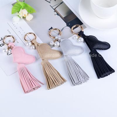 China Modern Factory Wholesale Heart Shape PU Tassel Key Chain Pendant Custom Fashion Key Chain Leather Accessories for sale