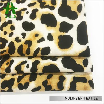 China Shaoxing Textile Simple Leopard Design FDY 4 Way Polyester Printed Lycra Fabric for sale