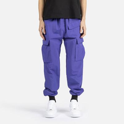 China New Anti-wrinkle 2021 men's loose jumpsuits men's outdoor fashionable multi-pocket harem sports cool pants for sale