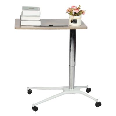 China Adjustable (Height) Mobile Standing Desk Height Adjustable Sit To Stand Table 30 Inch Pneumatic Laptop Desk With Fender Riser for sale