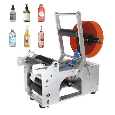 China 220V Semi-automatic Cheap Food Label Sticker Table Labeling Machine For Round Glass Jar Bottle mt 50 for sale