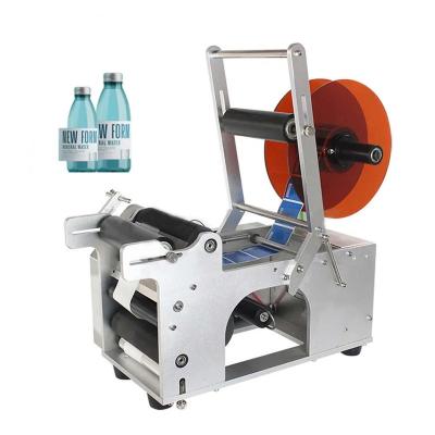 China Self Adhesive Small PET Food Bottle Sticker Labeling Machine For Round Bottles Semi-automatic for sale