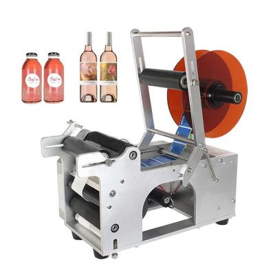 China China Mt 50 Honey Oil Round Bottle Pvc Food Sticker Labeling Machine Labeler Adhesive Dropper Bottle for sale