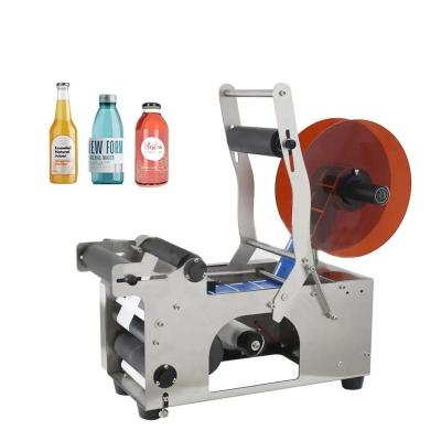 China Best Food Spice Small Wine Cheap Bottle Table Candle Jar Labeling Machine For Semi Automatic Tour Jars for sale