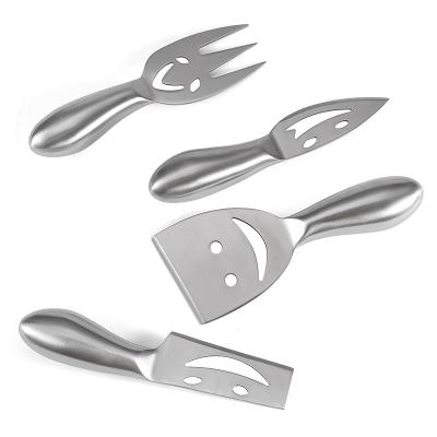 China Viable Our Factory Direct Sale 4piece 2Cr14 Stainless Steel Face Processed Cheese Knife Cavity Smile Handle for sale