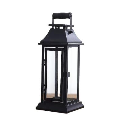 China Simple Chinese Portable Windproof Glass Outdoor Black Lanterns Home Decoration Candle Holder Wrought Iron Metal Lanterns Decor Retro for sale